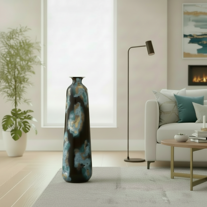Two decorative vases with a blue and black abstract pattern on a white background