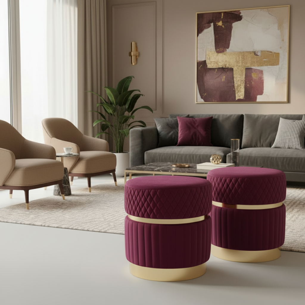 Modern living room with gray sofa, beige armchairs, and purple ottomans.