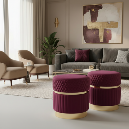 Modern living room with gray sofa, beige armchairs, and purple ottomans.