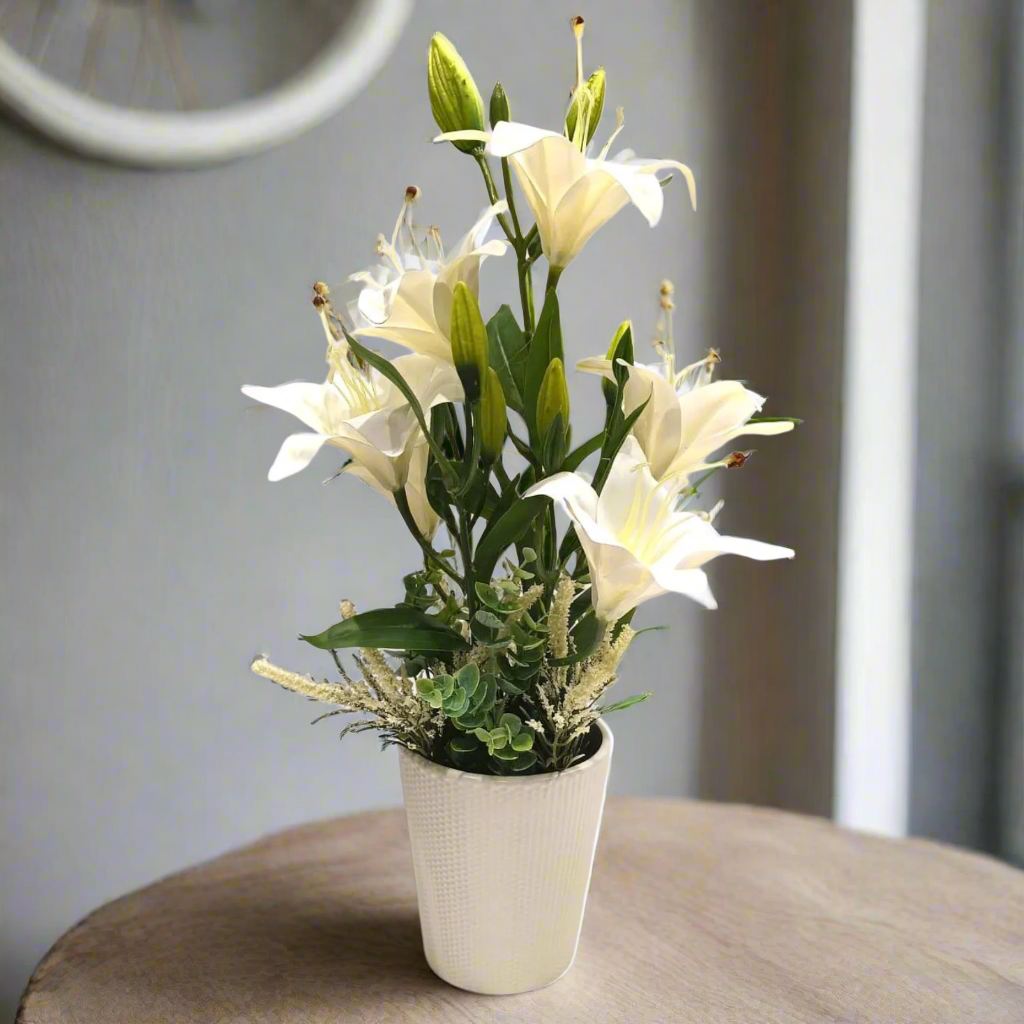 Pure Grace: Artificial White Lily Arrangement in Ceramic Textured Pot