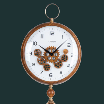 Wooden wall clock with gear design on a white background