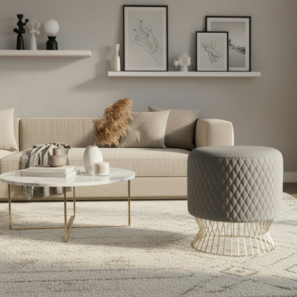 Modern living room with beige sofa, coffee table, and ottoman.