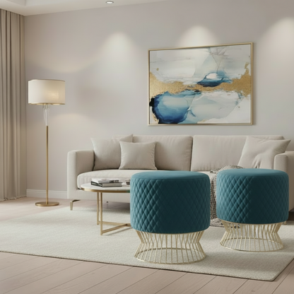Modern living room with beige sofa, blue ottomans, and abstract art on the wall.