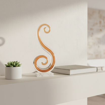 Decorative wooden sculpture on a white surface with a blurred indoor setting