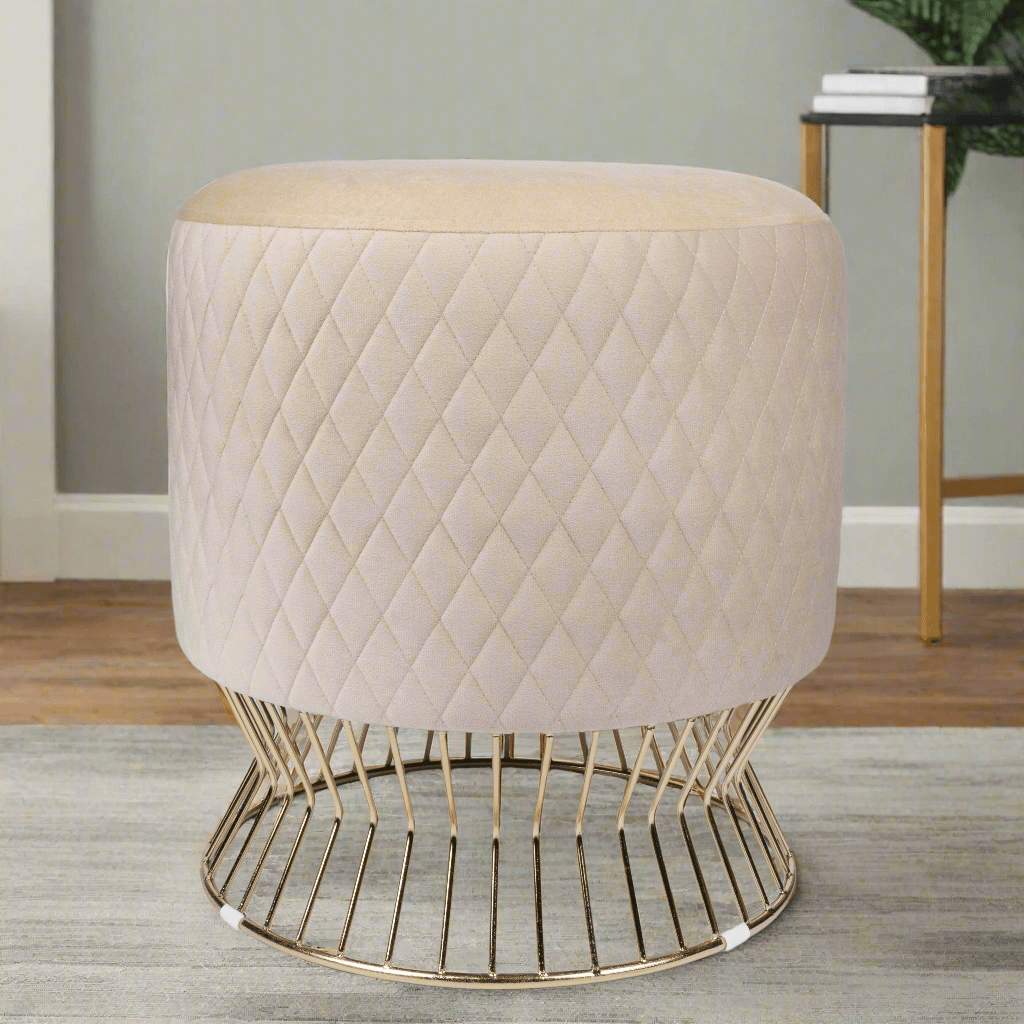 Elegant Beige Velvet Quilted Ottoman with Gold Wireframe Base