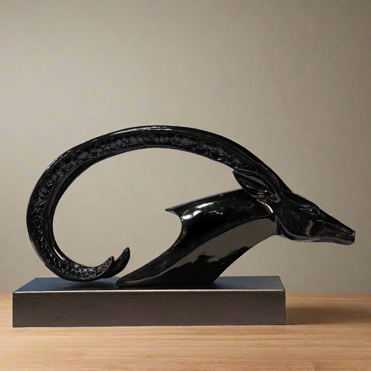 Midnight Horizon: Abstract Black Horned Sculpture