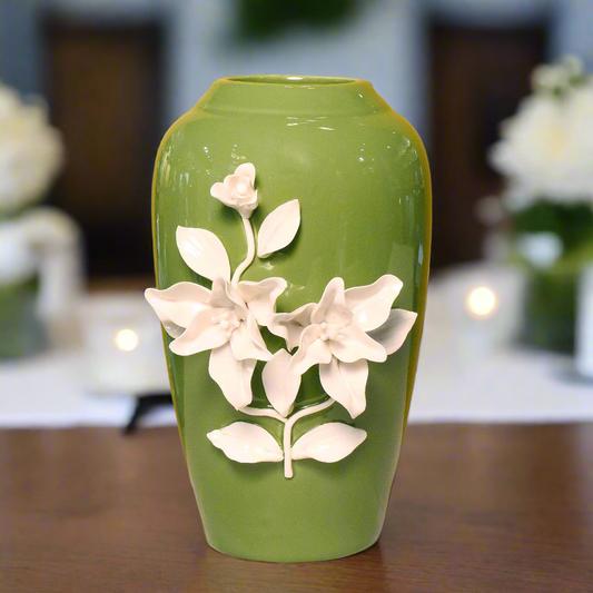 Verdant Elegance: Ceramic Vase with Sculpted White Blooms
