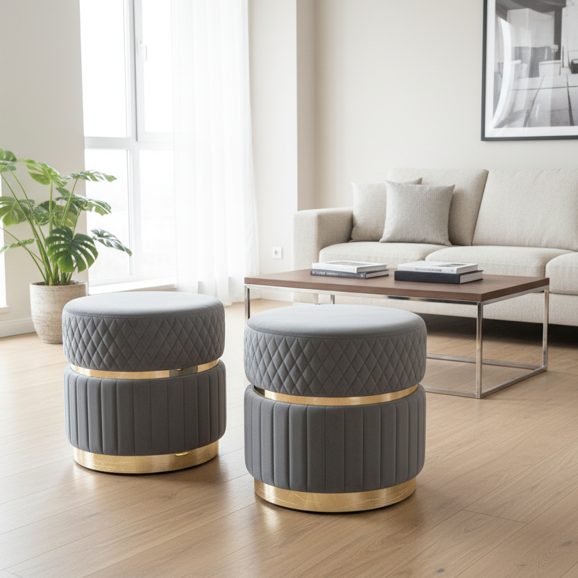 Two gray ottomans with gold bases in a modern living room.