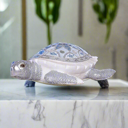 Oceanic Bloom: Embellished Silver & Blue Turtle Sculpture