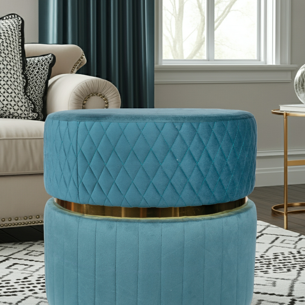 Blue round ottoman with quilted design on a white background