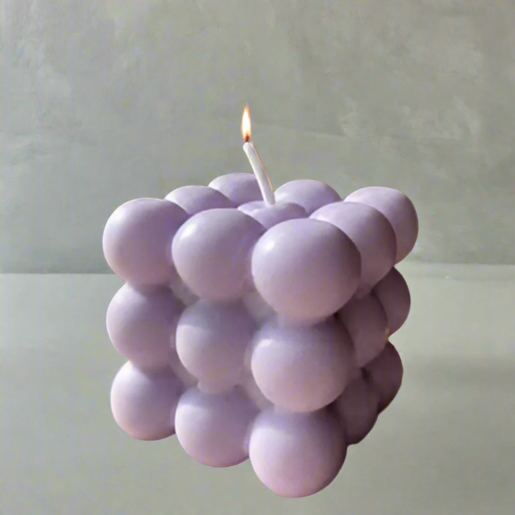 Cube-shaped soy wax candle with purple bubbles