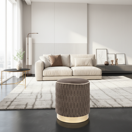 Modern living room with a beige sofa, side table, and decorative elements.