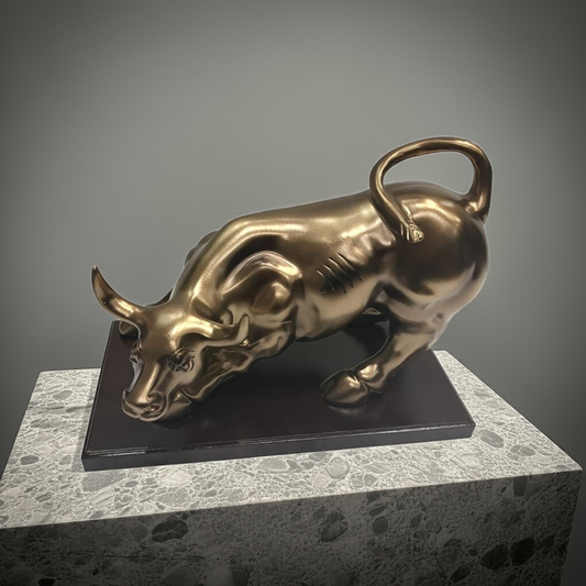 Mighty Momentum: Bronzed Bull Sculpture