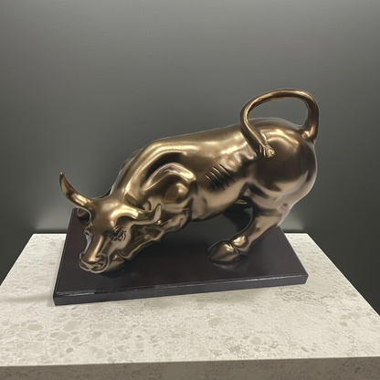 Mighty Momentum: Bronzed Bull Sculpture