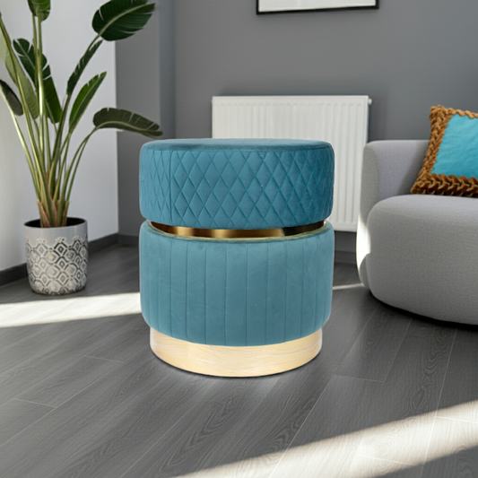 Blue round ottoman with quilted design on a white background