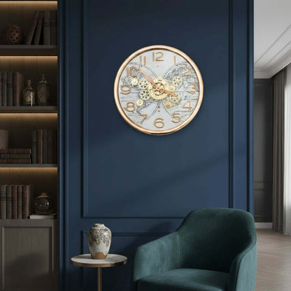 Decorative clock with gold gears and numbers on a light background