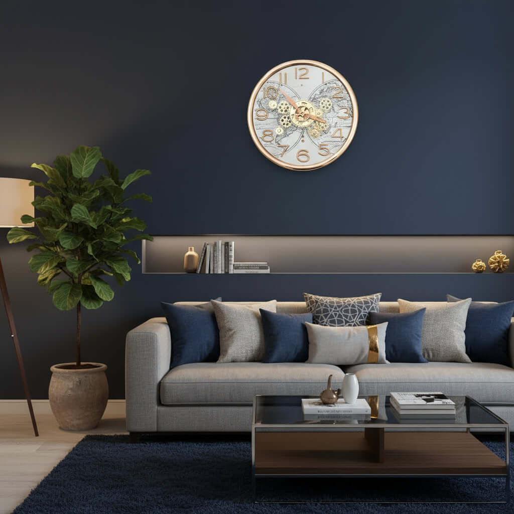 Decorative wall clock with gold gears and numbers on a light gray background